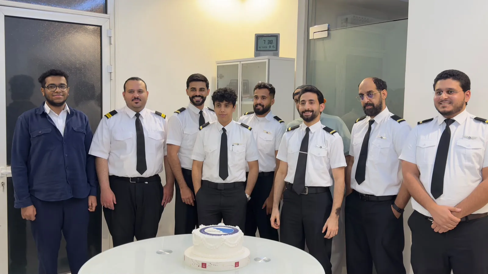 A graduating group celebrating the completion of their program
