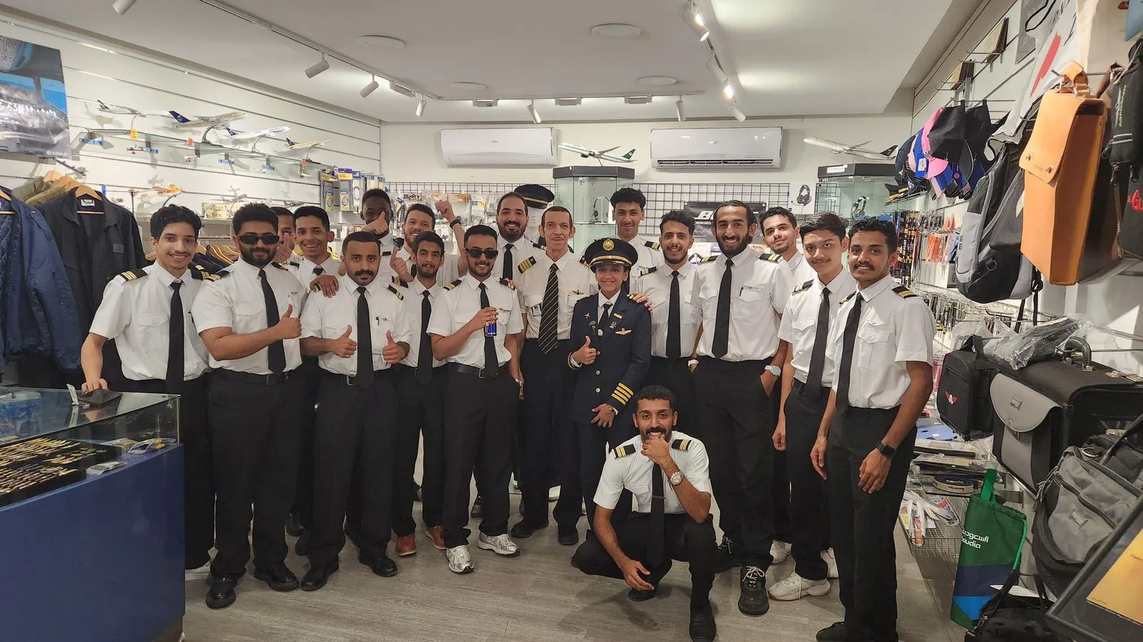Trainees in uniform at the Aviation Pioneers pilot shop